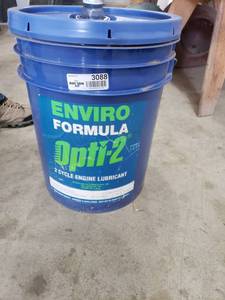 lot 3088 image: Enviro Formula Optic-2 2 Cycle Oil (Approx. 4 Gallon)
