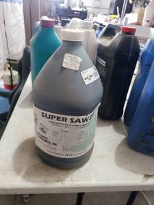lot 3090 image: Super Sawzit Sawing Lubricant for Bandsaws