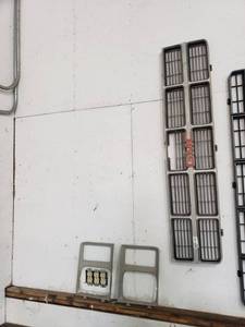 lot 3114 image: OEM GMC Grille w Headlight Bezels