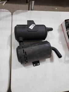 lot 3127 image: two small mufflers