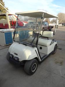 lot 3135 image: Yamaha drive golf cart w winter enclosure- Brand New Batteries Excellent shape w charger