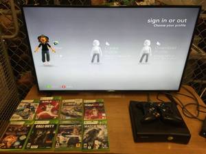 lot 5294 image: XBOX 360 with 2 Controllers and 8 Games