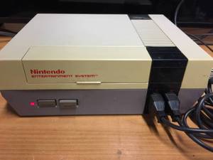 lot 5299 image: Original NES System with 2 Controllers and 5 Games