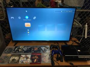 lot 5301 image: Playstation 3 with 2 Controllers, 10 Games and  Camera