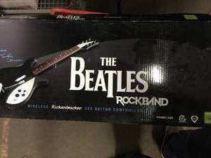 lot 5314 image: The Beatles Rockband Guitar and Game