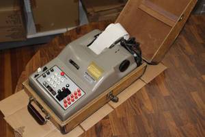 lot 2818 image: Vintage Electronic Olivetti - underwood Adding Machine in Hard Case