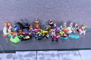 lot 2823 image: Large Lot of Assorted Figurine Toys. Vintage Animal, Disney, and Happy Meal Toys