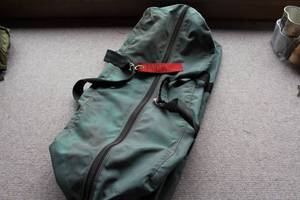 lot 2874 image: Large London Bridge Trading Co. Green Duffle Bag 29x15