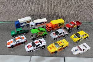 lot 2902 image: Lot of 12 Matchbox Cars From 1972- 2001 Includes 2 Lesney Cars, 5 Pull Back Cars, and 3 Box Trucks