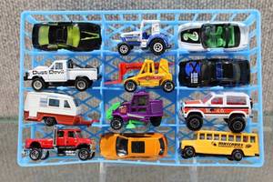 lot 2904 image: Lot of 12 Matchbox Cars from 1985- 2006 Includes Tractors, School Bus, and Camper