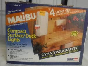 lot 12467 image: Malibu 4 piece low voltage deck lights