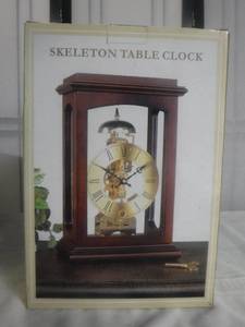 lot 12468 image: Skeleton table clock