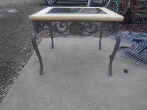 lot 12480 image: Glass top coffee table with iron and stone details