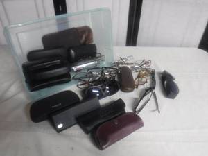 lot 12638 image: Eyeglasses and cases