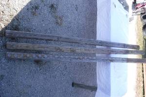 lot 11003 image: Three Wooden Poles