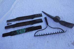 lot 11025 image: Three Lawnmower Blades, Pickaxe Head, and Rake Head