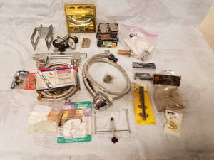 lot 11486 image: Door Parts, Plumbing Accessories, Caster Wheels, Brackets, and More