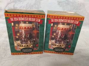 lot 11501 image: Pair of 1994 Budweiser Holiday Steins