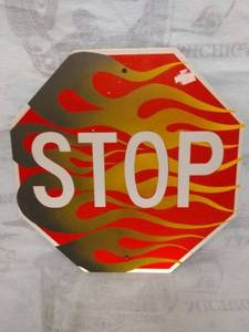 lot 11517 image: Flaming Stop Sign Wall Hanger