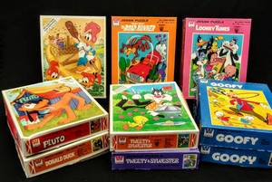 lot 93 image: 1970s Cartoon Jigsaw Puzzles  (9) Looney Tunes, Road Runner & More