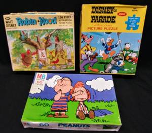 lot 94 image: 1960s Peanuts & Disney Kids Puzzles