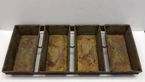 lot 222 image: Vintage 4-Strap Industrial Bread Loaf Pan  Steampunk