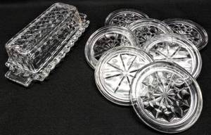 lot 225 image: Set of 7 Fostoria American Coasters with Bonus Butter Dish