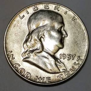 lot 251 image: 1957 D Ben Franklin Silver Half Dollar