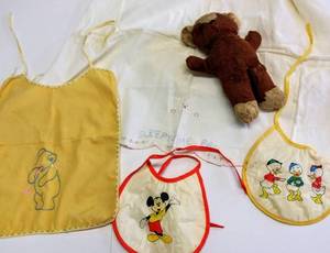 lot 270 image: Old Baby Bibs, Blanket & Wind up Musical Bear That Works