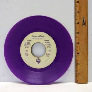 lot 301 image: 1984 WB Prince and the Revolution Purple Rain GOD 45 Record