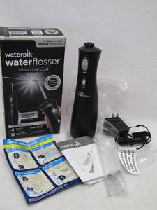 lot 5819 image: Waterpik Cordless Plus Waterflosser  Appears to be New