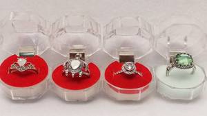 lot 5948 image: 4 Alluring Fashion Rings In Ring Boxes