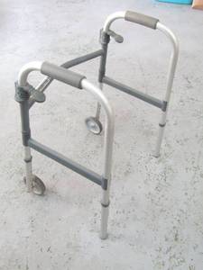 lot 5880 image: Walker with Front Wheels  Folds up for Easy Travel