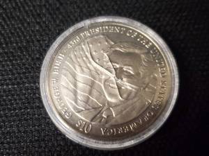 lot 303 image: $10 George W Bush Coin