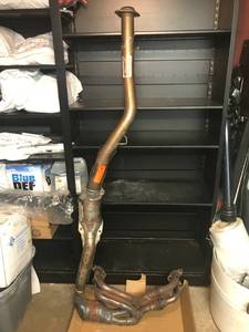 lot 1093 image: MUFFLER SYSTEM FOR A VEHICLE