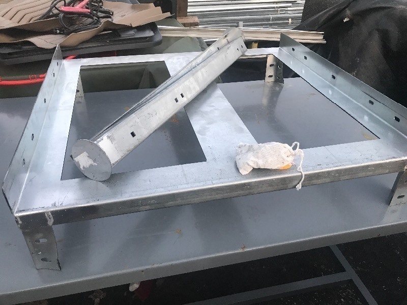 lot 10696 image: New 30 x 30 steel table frame with legs and bolt package as pictured for easy transport