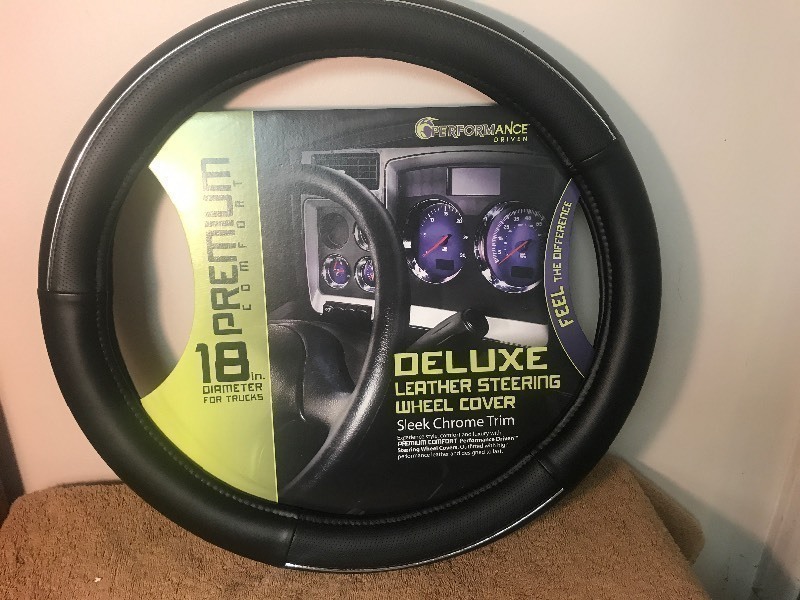 lot 191 image: New deluxe steering wheel cover as pictured