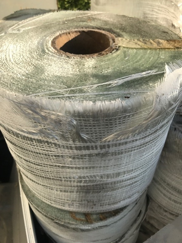 lot 229 image: Large roll of fiberglass fabric estimated 12 inches wide by 300 feet long could be longer