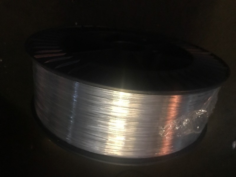 lot 319 image: Large 35 pound spool of 24 gauge wire as pictured