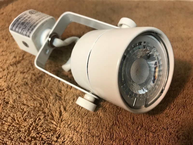 lot 462 image: Two new track light fixture with LED light bulb included as pictured