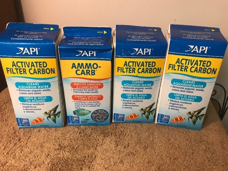 lot 6 image: Three large containers of aquarium filter carbon