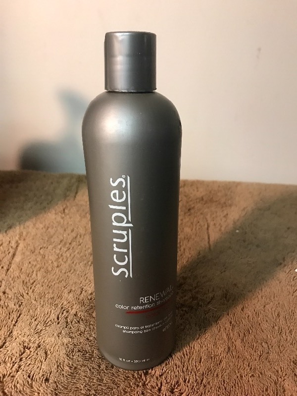 lot 684 image: Four bottles of high dollar hair care product shampoo as pictured