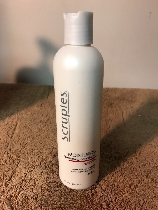 lot 685 image: Four bottles of high dollar hair care conditioner replenishing