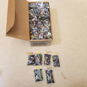 lot 1 image: a box of approximately 65 bags of glass jewelry beads
