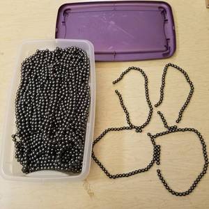 lot 24 image: tote full of 8 mm round stranded jewelry beads