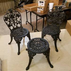 lot 32 image: 4 cast iron doll chairs and 2 cast-iron doll tables- all unassembled, new in box
