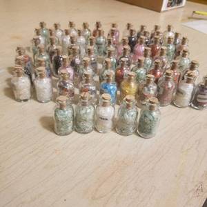 lot 50 image: 65 assorted small gem bottles