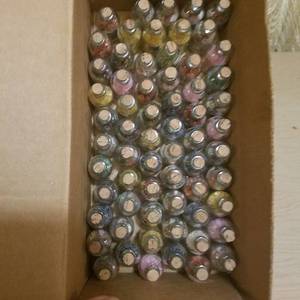 lot 52 image: approximately 60 assorted small gem bottles