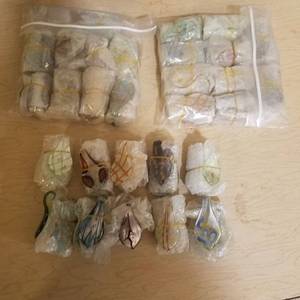 lot 57 image: approximately 150 glass jewelry pendants