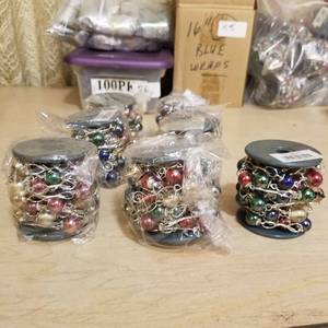 lot 60 image: 7 rolls of chain glass link - 3 meters per roll